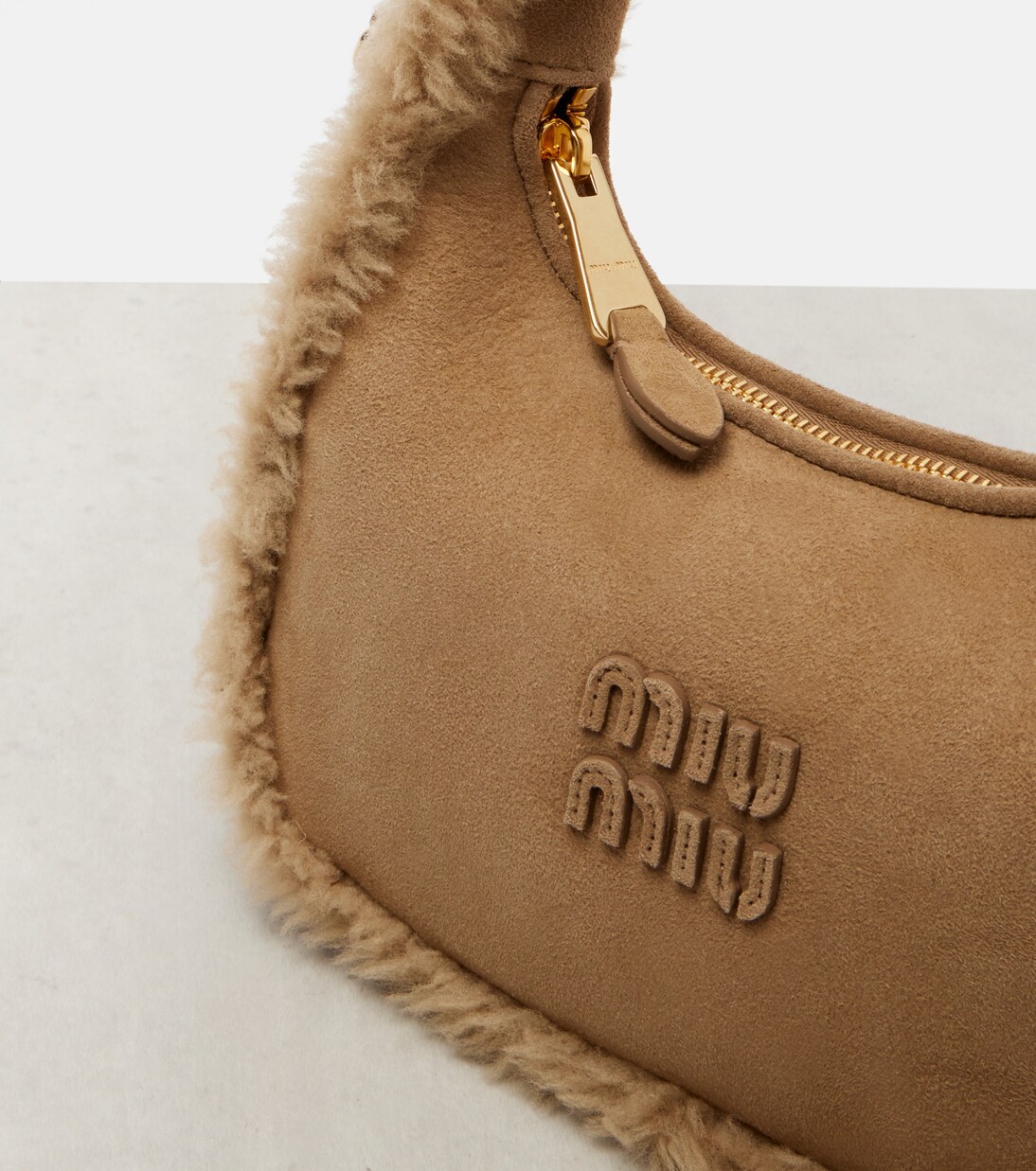 Wander suede top-handle bag | Miu Miu