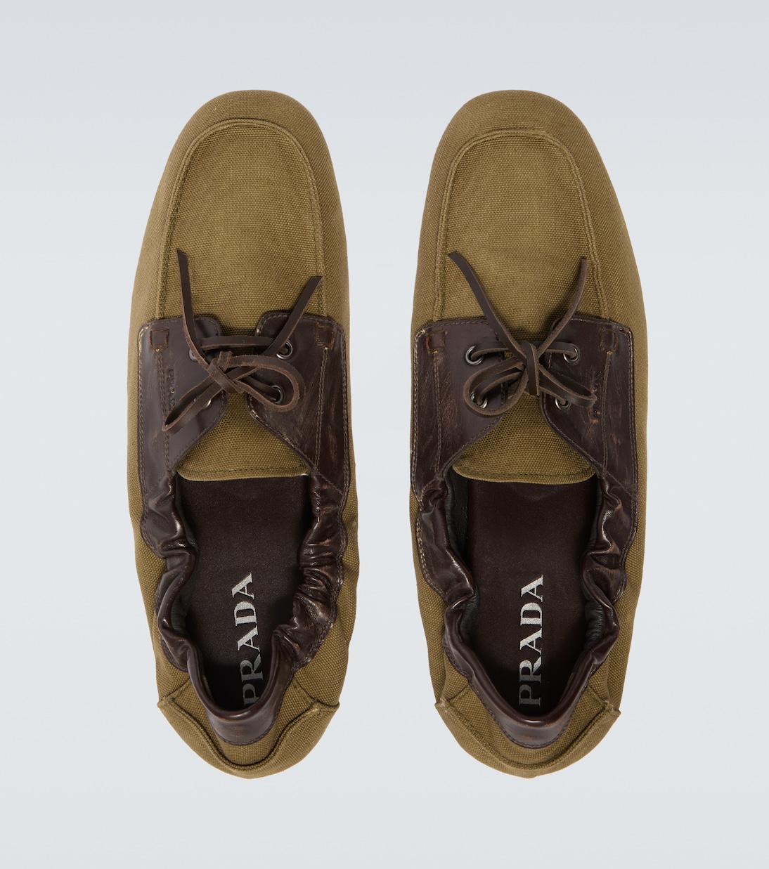 Shuffle leather-trimmed canvas boat shoes | Prada