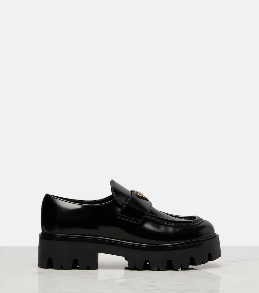 Logo leather platform loafers | Prada
