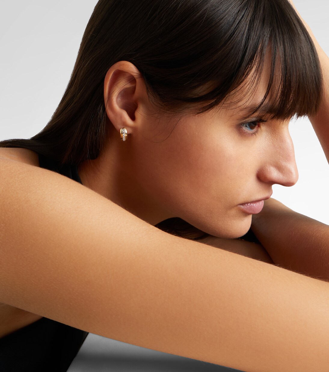 14kt gold huggie earrings with diamonds | Stone and Strand