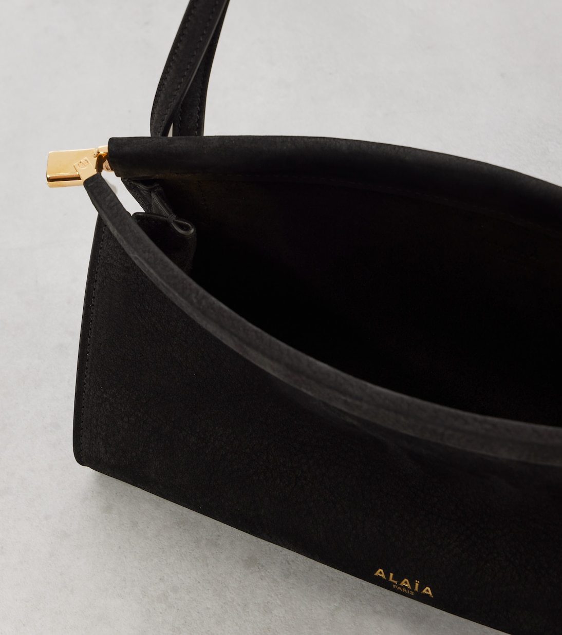 Le Click East West Small shoulder bag | Alaïa