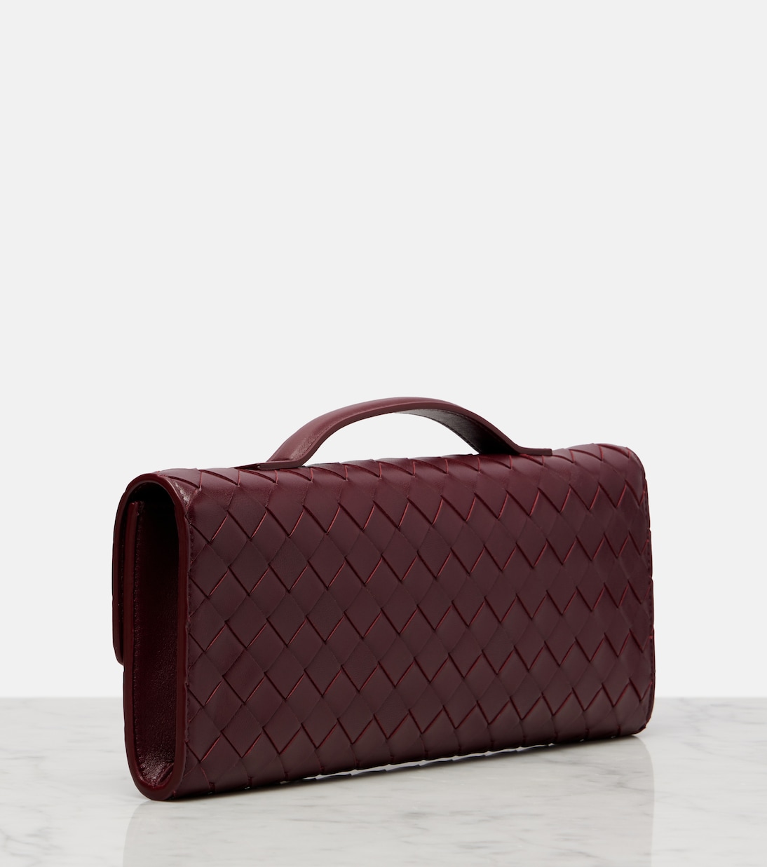 Andiamo Intrecciato leather clutch | Bottega Veneta