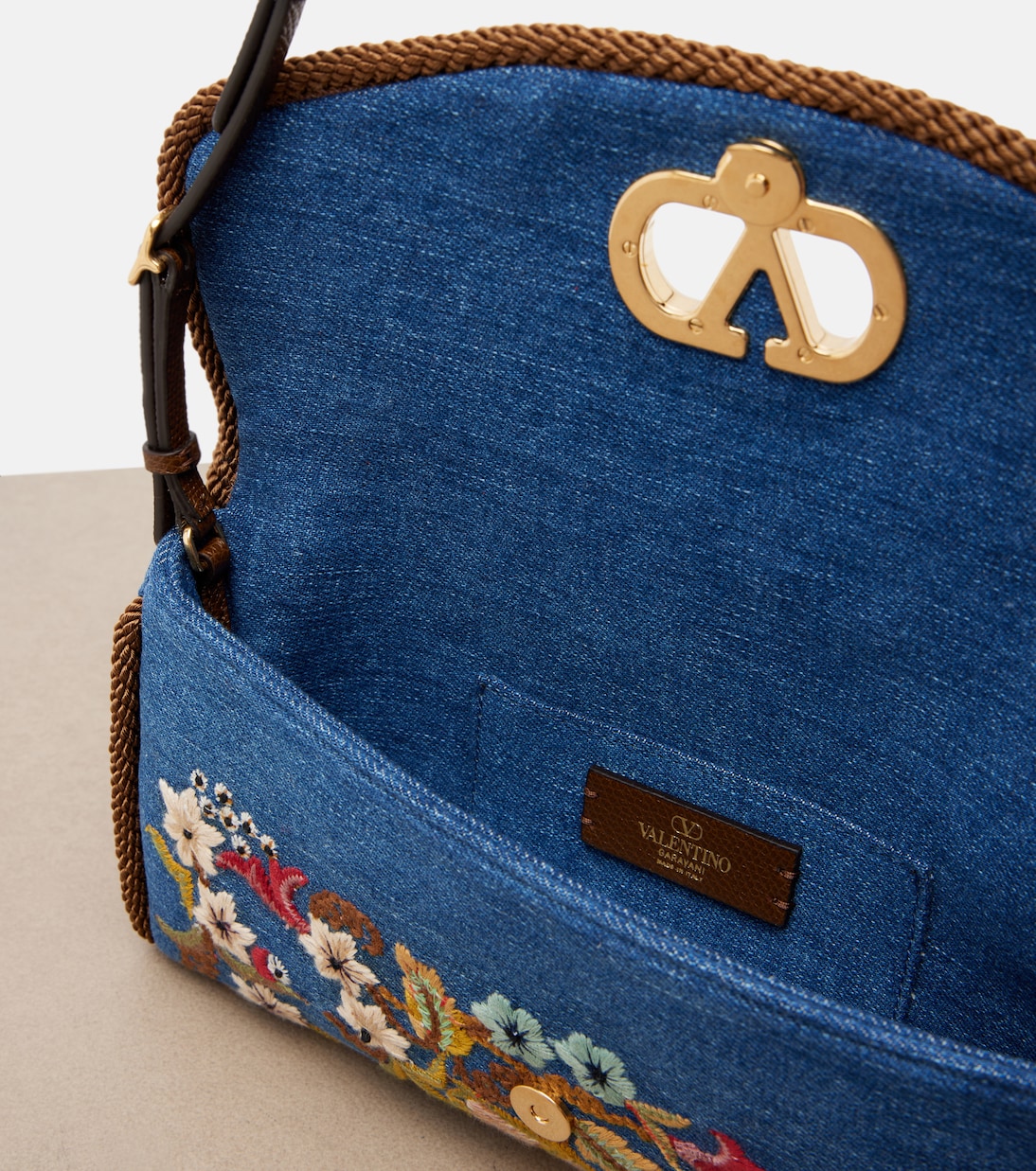 DeVain Small embroidered denim shoulder bag | Valentino Garavani