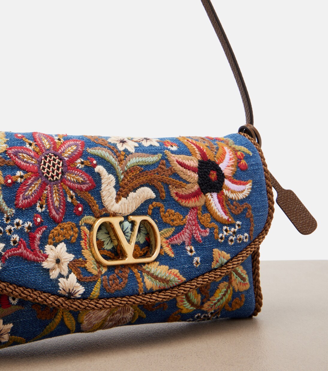 DeVain Small embroidered denim shoulder bag | Valentino Garavani