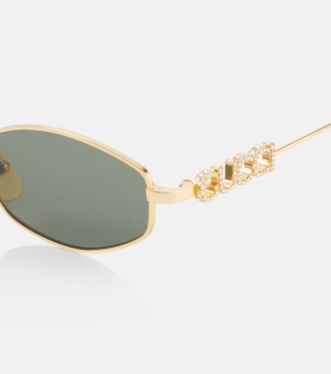 Ovale Sonnenbrille mit Kristallen | Gucci