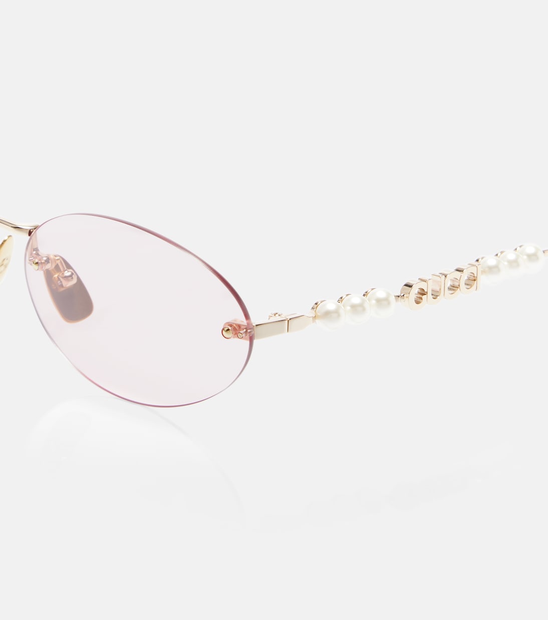 Logo embellished oval sunglasses | Gucci