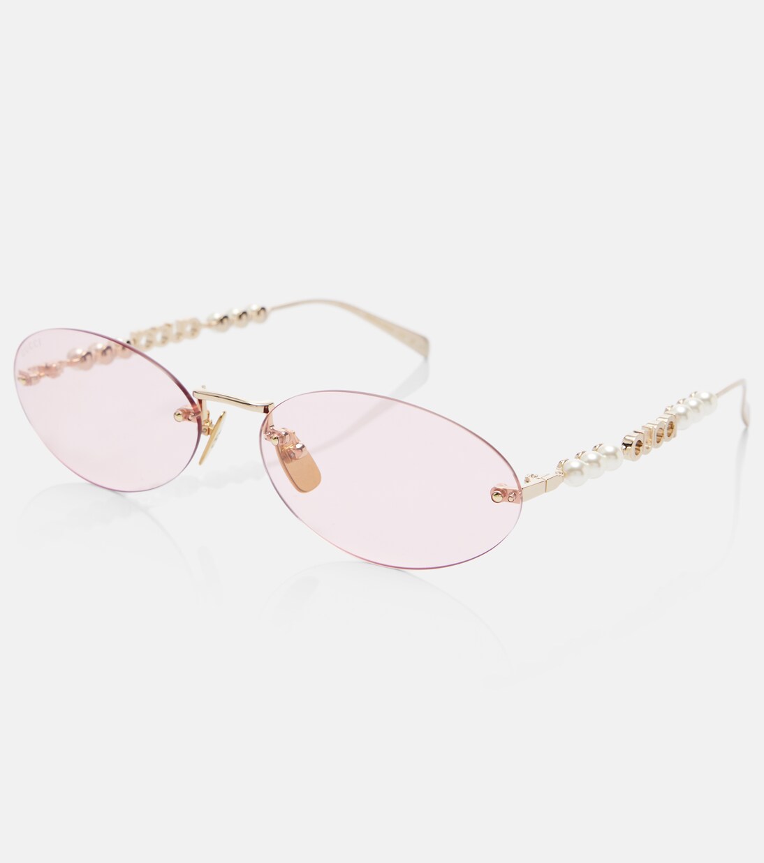 Logo embellished oval sunglasses | Gucci