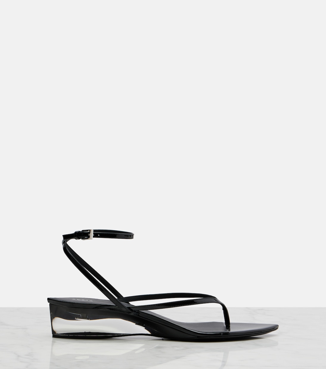 Invisible patent leather thong sandals | Alaïa