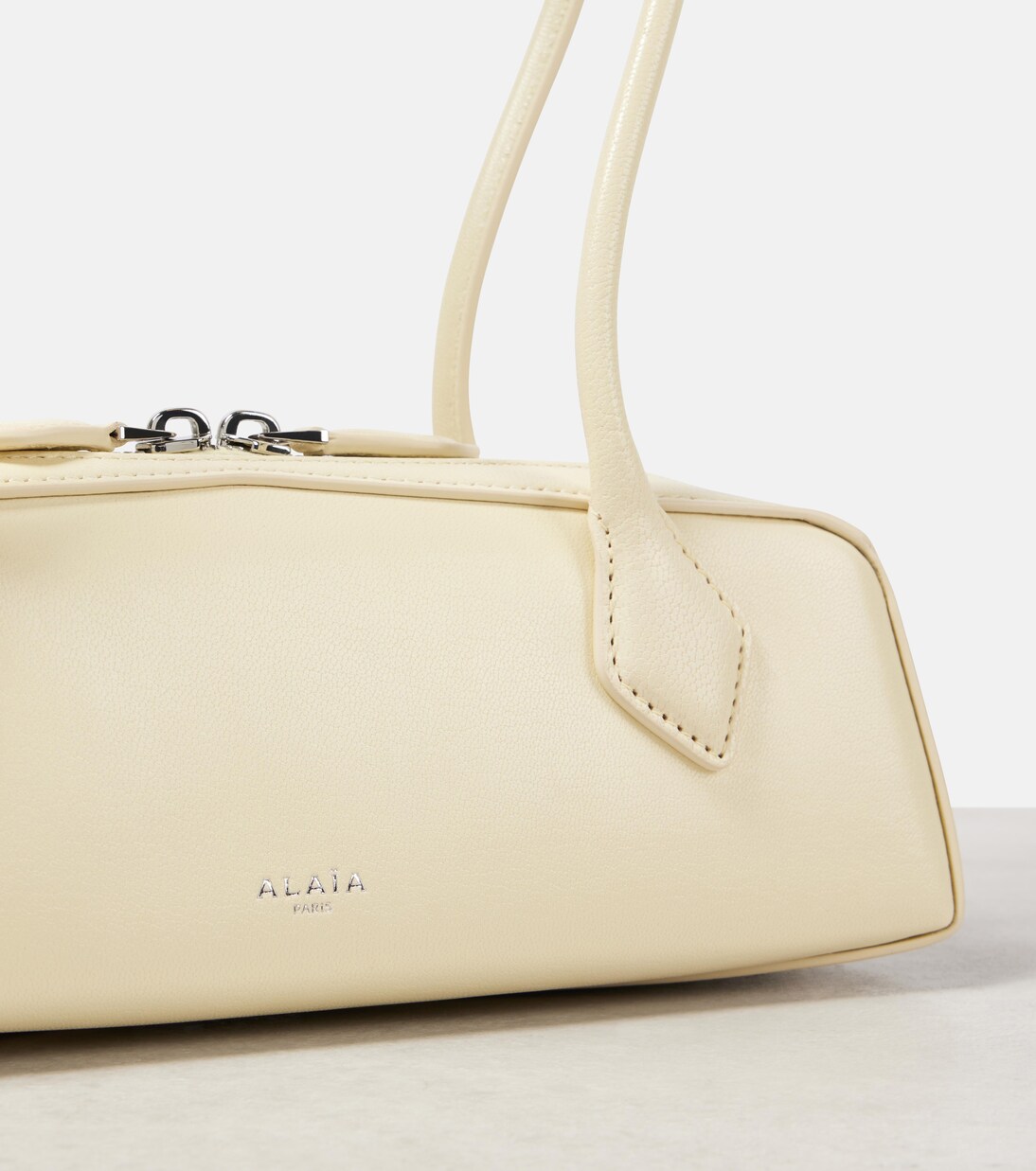 Le Teckle Small leather shoulder bag | Alaïa