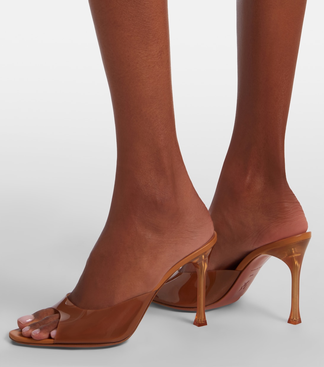 Alexa PVC mules | Amina Muaddi