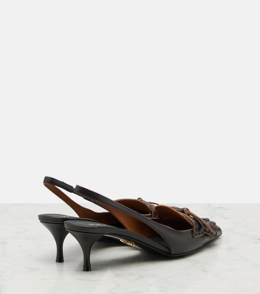 Bow-detail leather slingback pumps | Prada