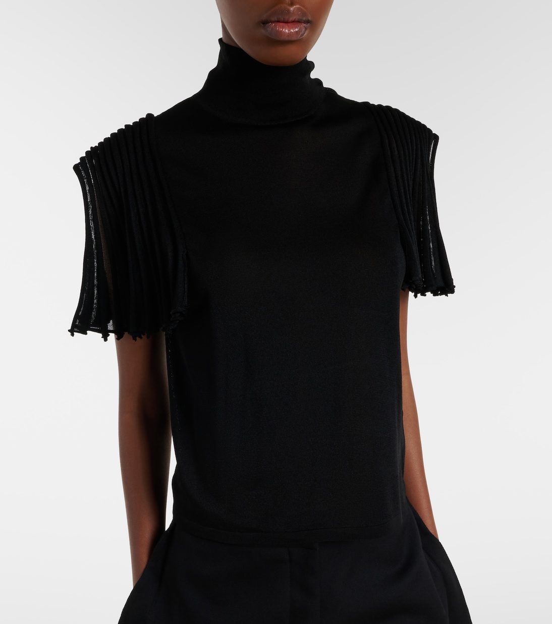 Semi-sheer turtleneck top | Alaïa