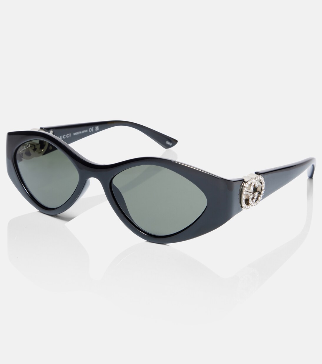 Interlocking G crystal-embellished oval sunglasses | Gucci