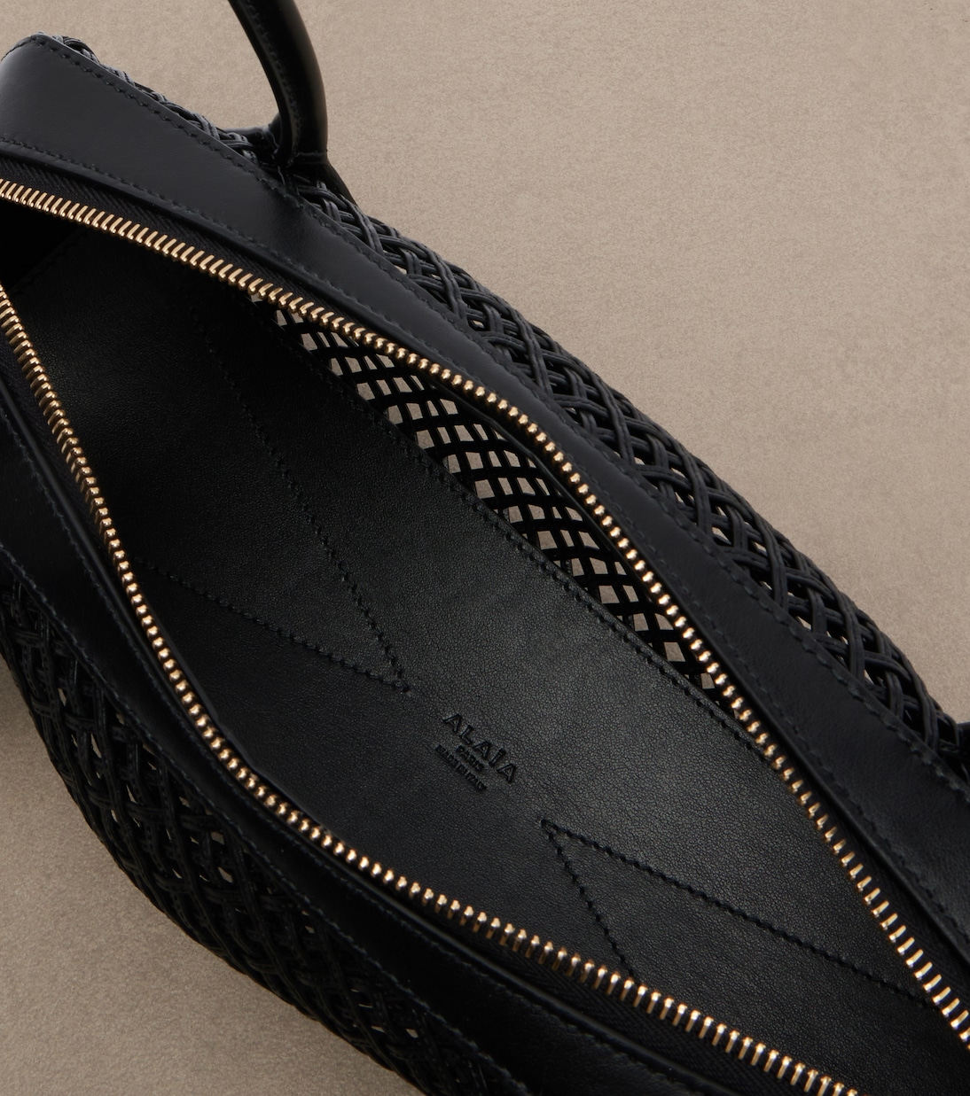Le Teckel Medium woven leather shoulder bag | Alaïa