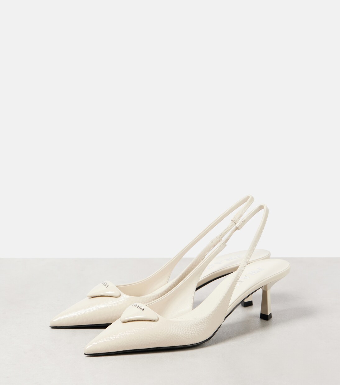 Patent leather slingback pumps | Prada