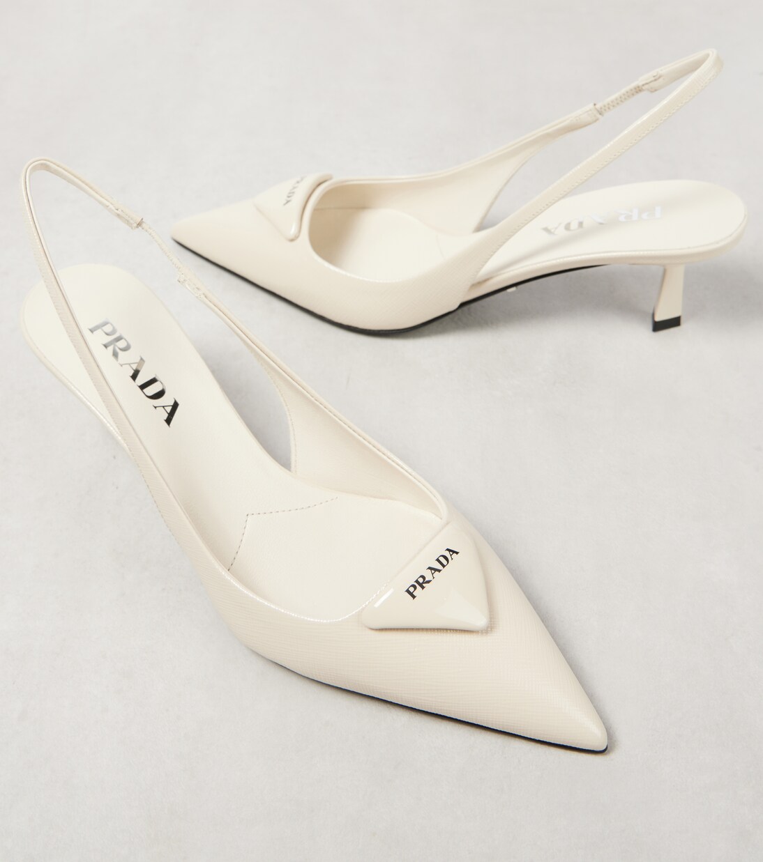 Patent leather slingback pumps | Prada