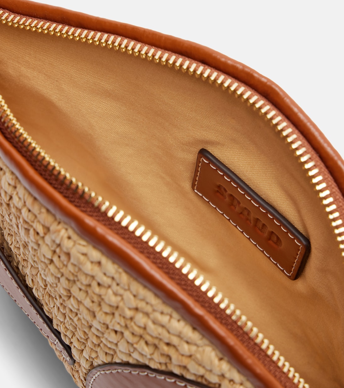 Pesce leather-trimmed raffia clutch | Staud