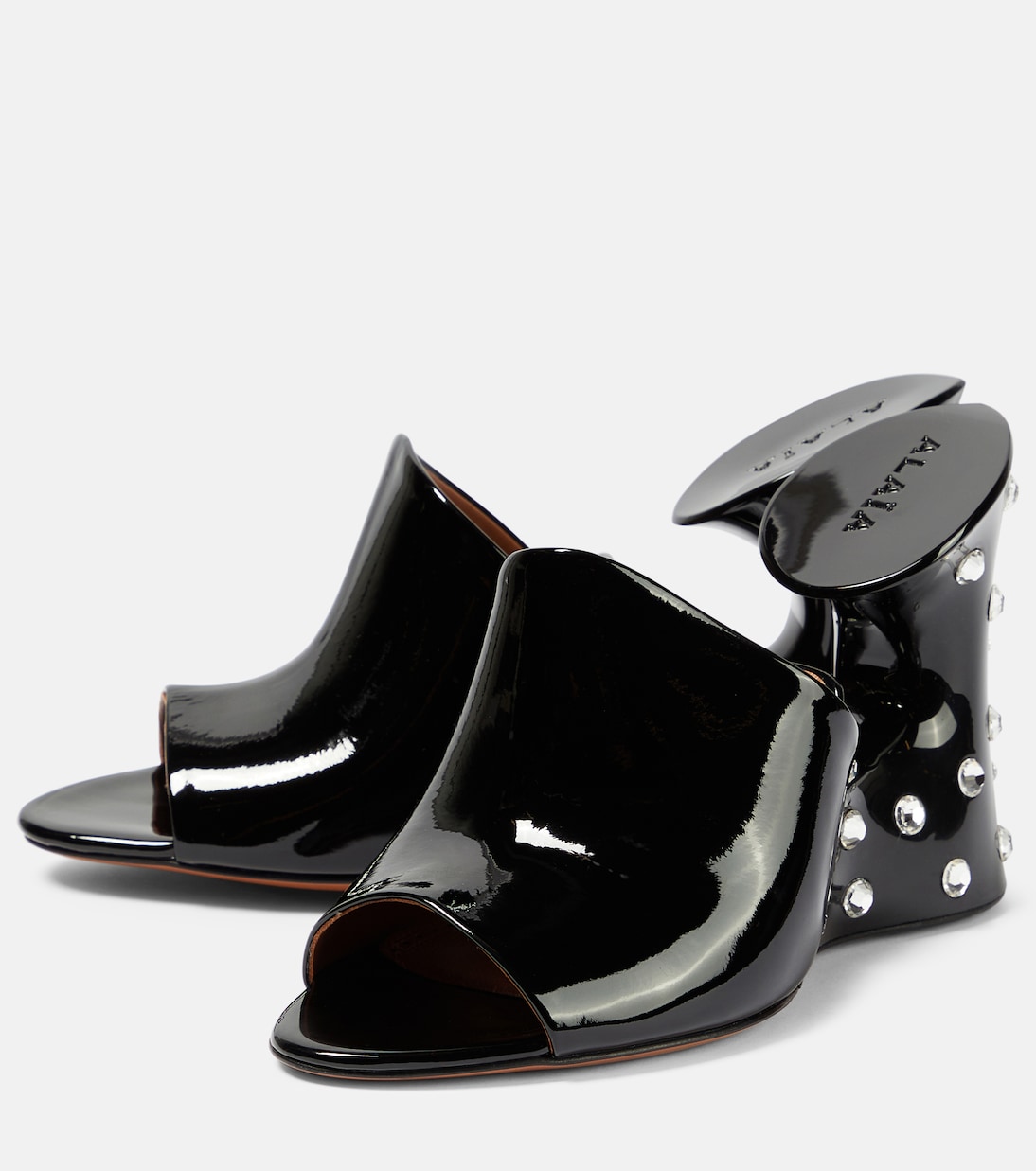 Mules La Sculpture en cuir verni | Alaïa
