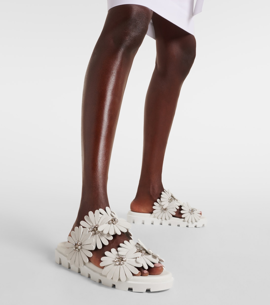 سلايدز من الجلد السويدي والجلد Flora Cool | Christian Louboutin