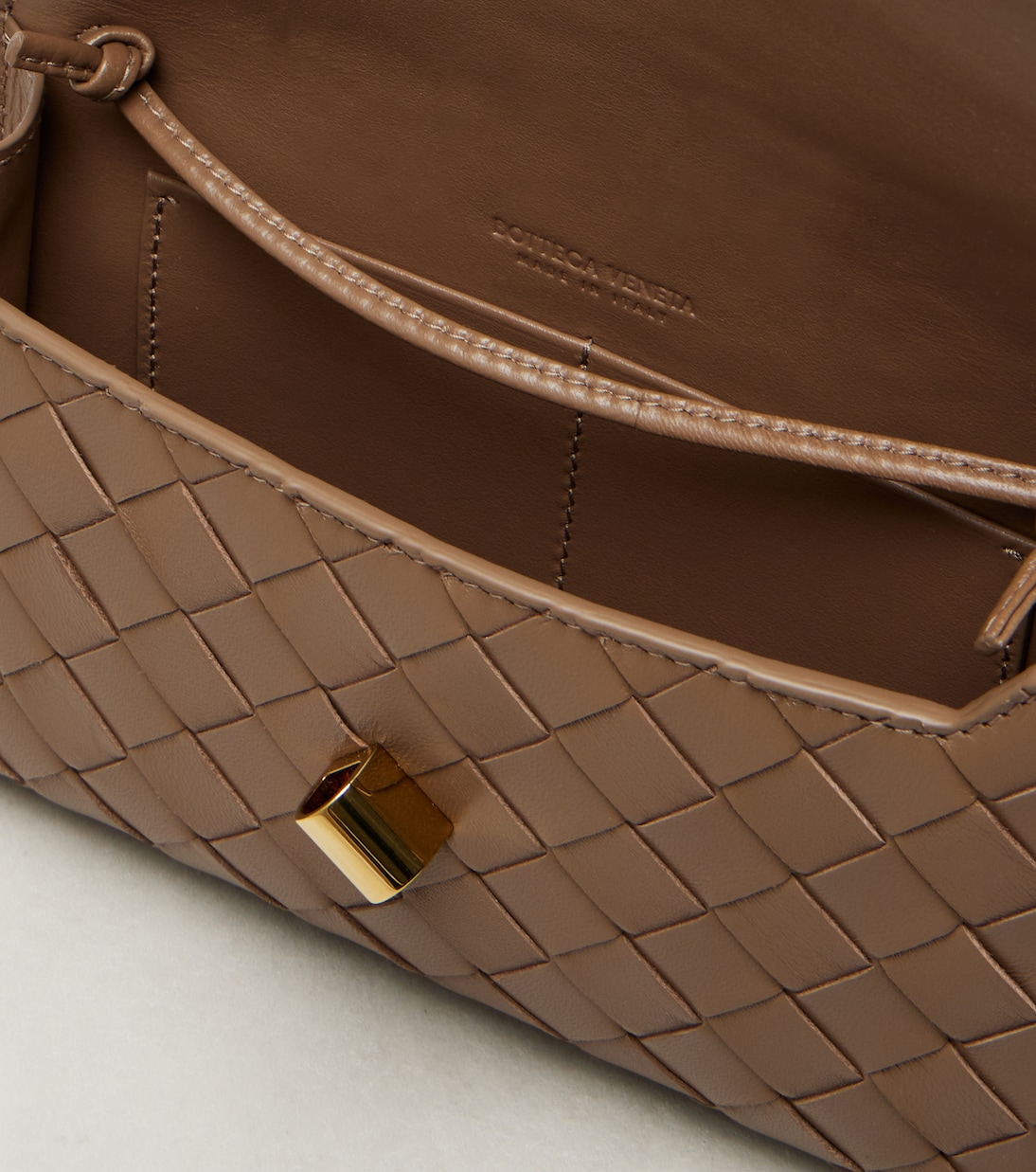Andiamo Intrecciato leather clutch | Bottega Veneta