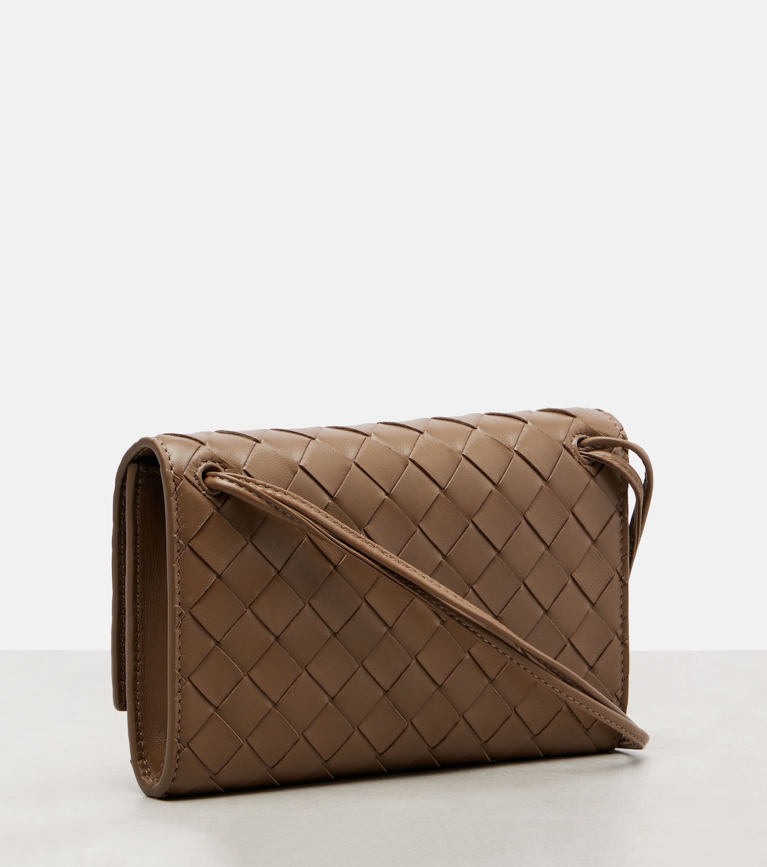 Andiamo Intrecciato leather clutch | Bottega Veneta