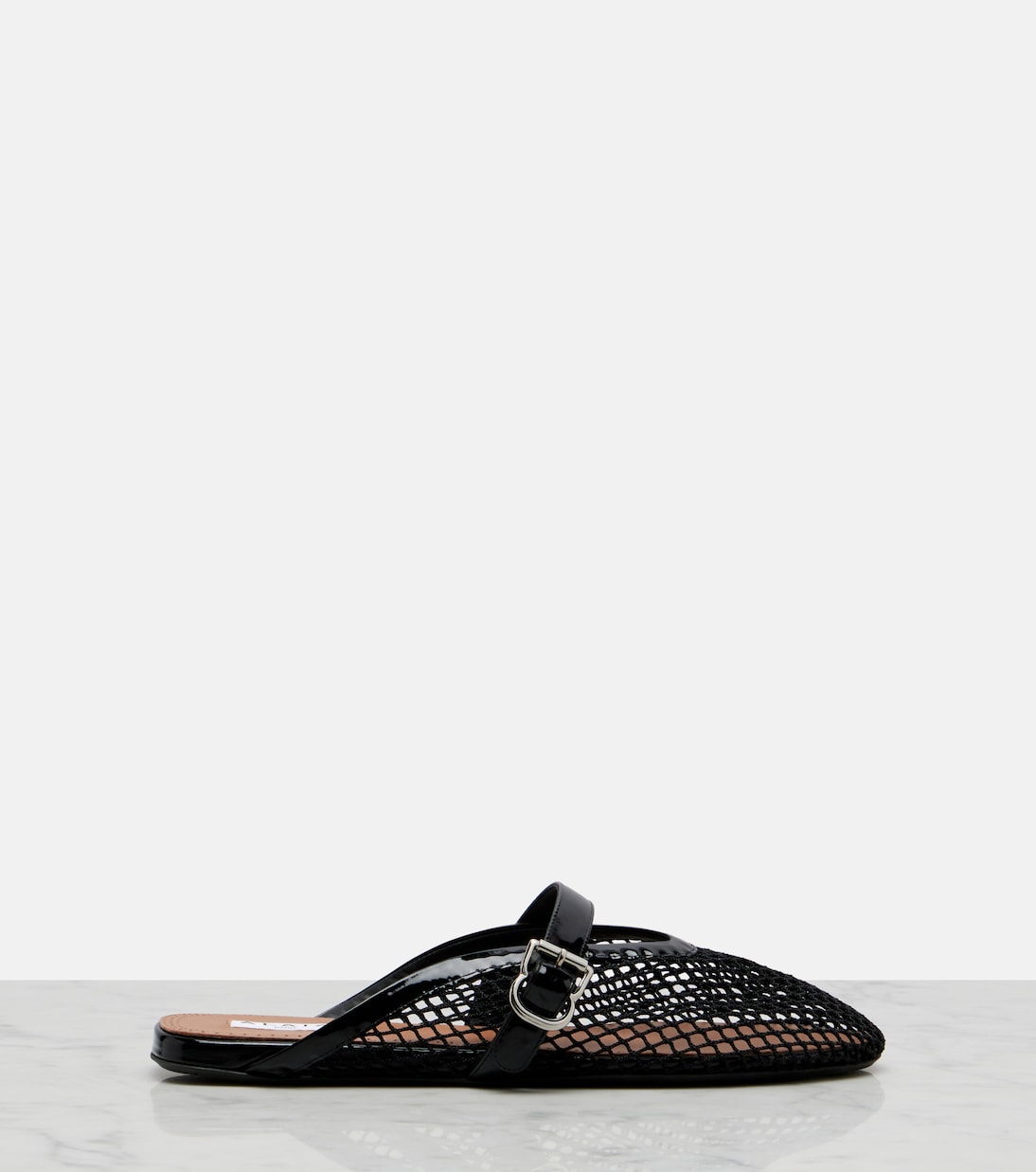 Fishnet leather-trimmed mules | Alaïa