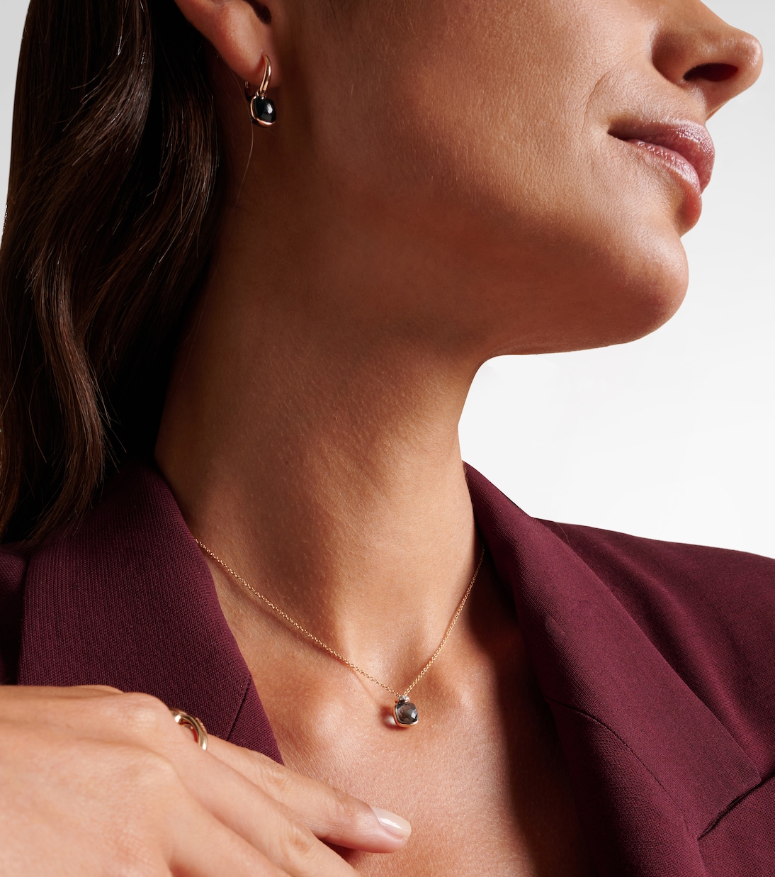 Nudo Mini 18kt rose gold (750/1000) necklace with topaz and diamonds | Pomellato