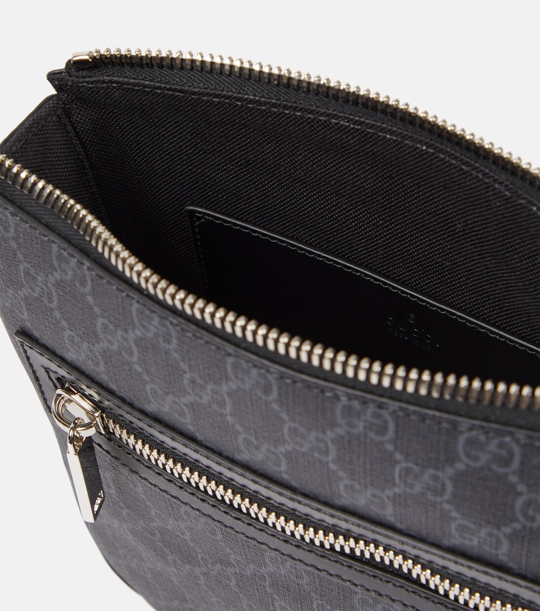 GG canvas leather-trimmed crossbody bag | Gucci