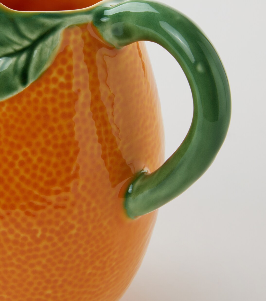 Orange earthenware jug | Bordallo Pinheiro
