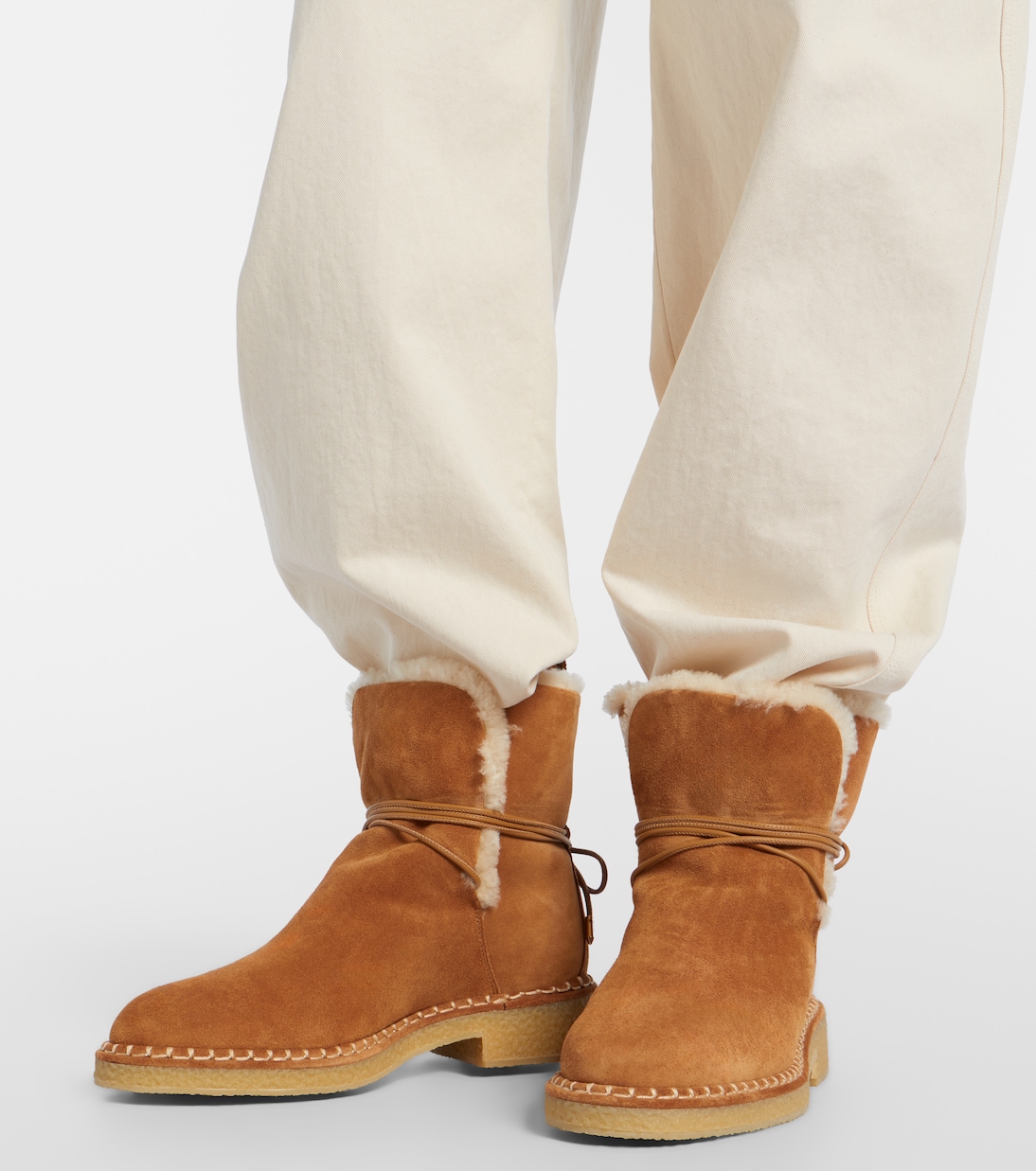 Megeve shearling-trimmed suede ankle boots | Aquazzura