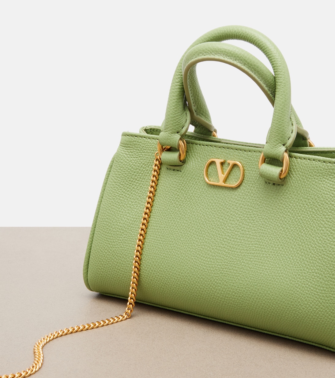 VLogo Mini leather top-handle bag | Valentino Garavani