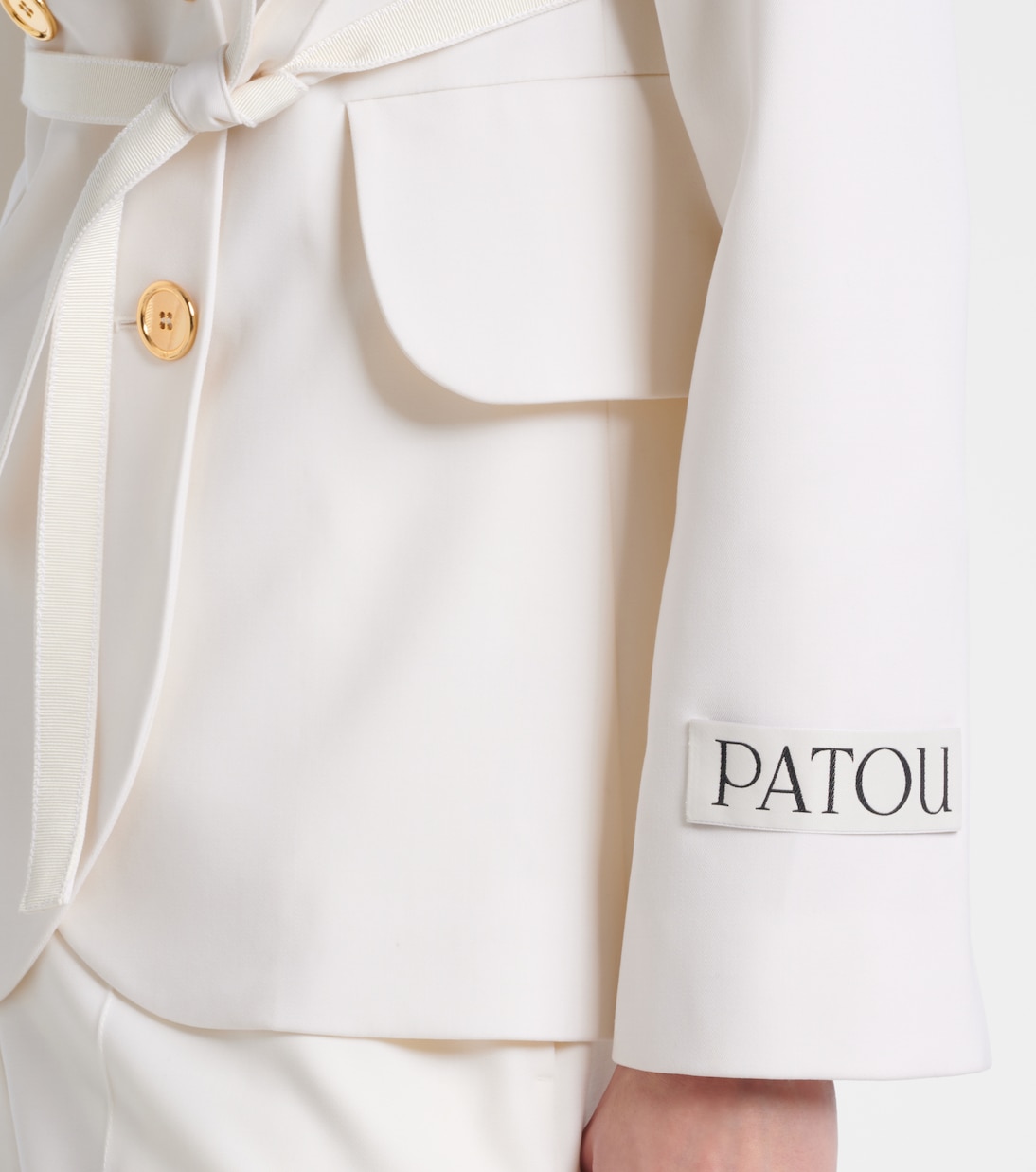 Double-breasted belted wool-blend blazer | Patou