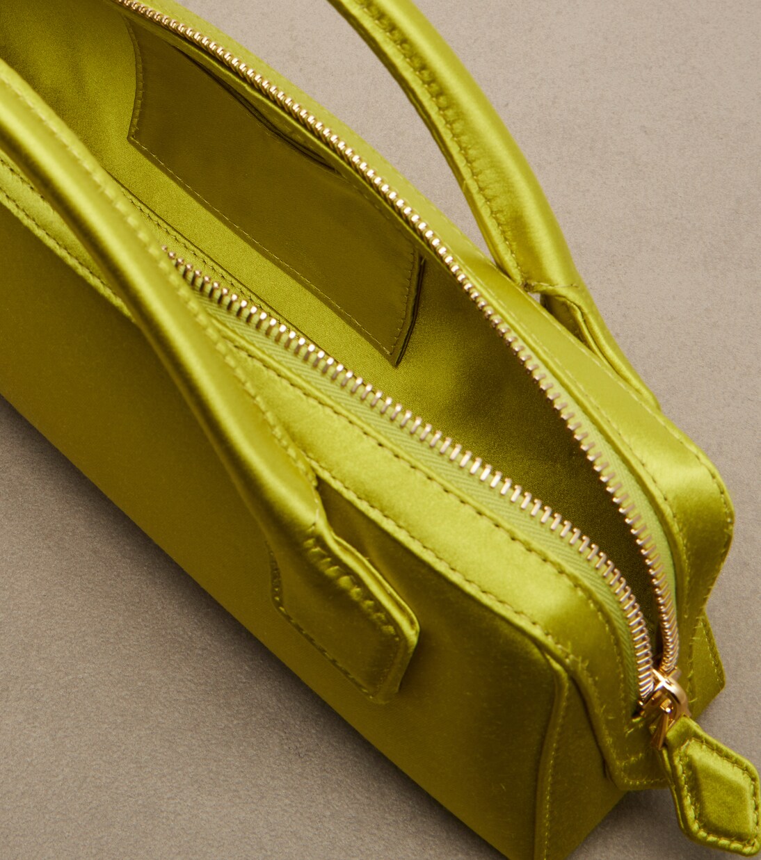 Le Teckel Small satin clutch | Alaïa