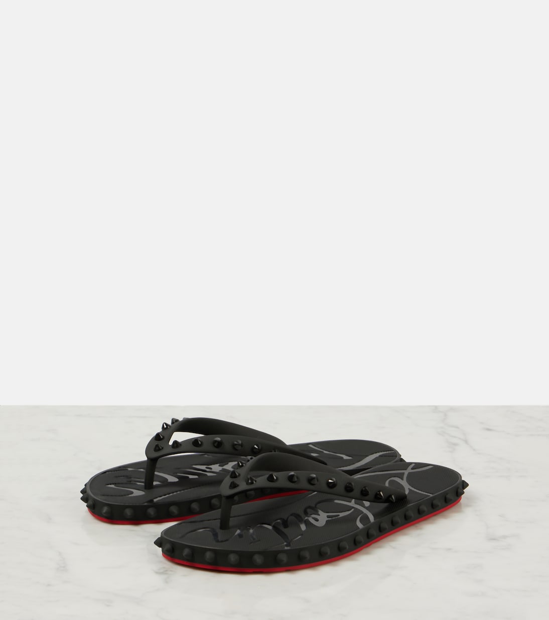 صندل بإصبع Super Loubi Flip | Christian Louboutin