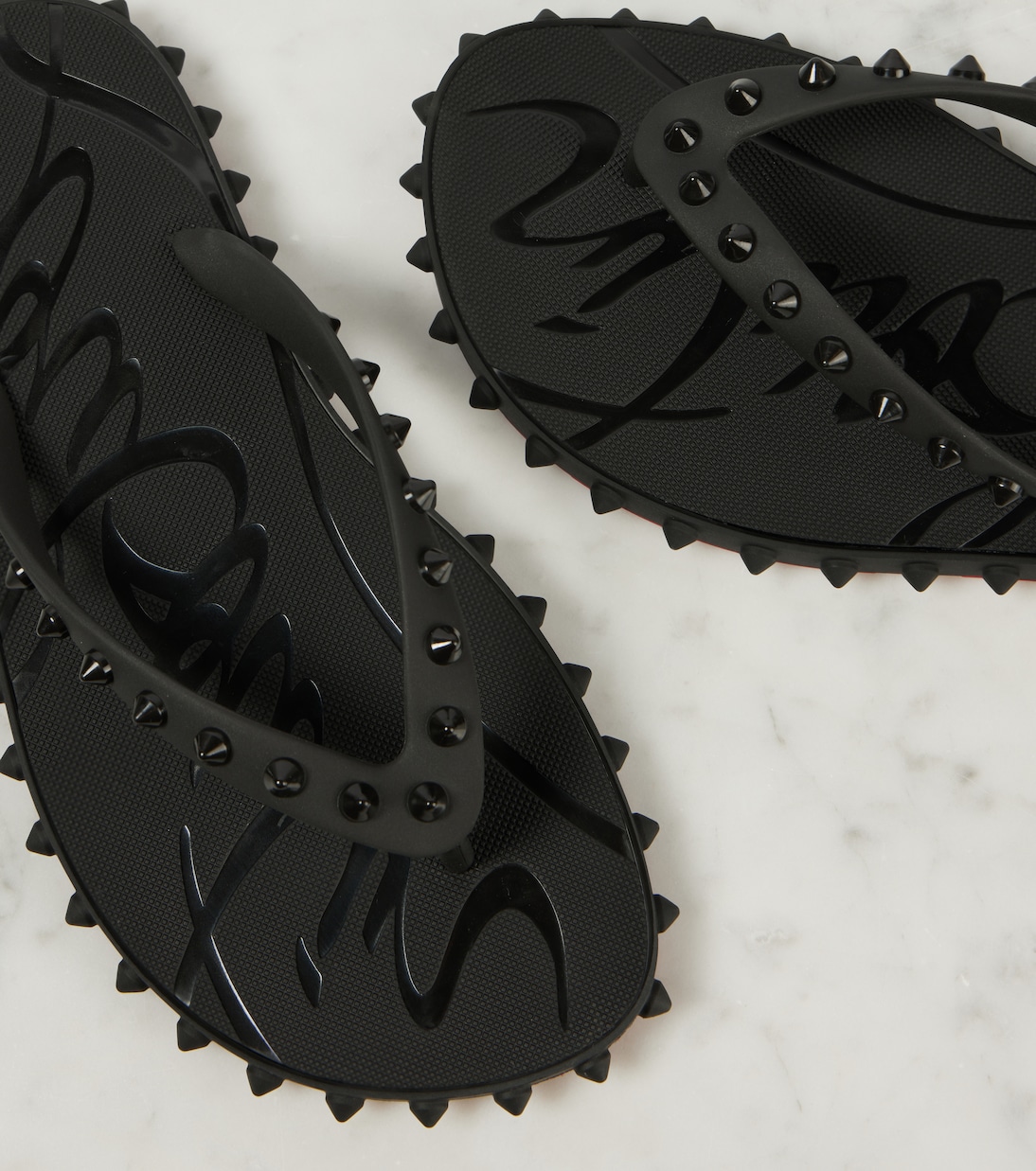 صندل بإصبع Super Loubi Flip | Christian Louboutin