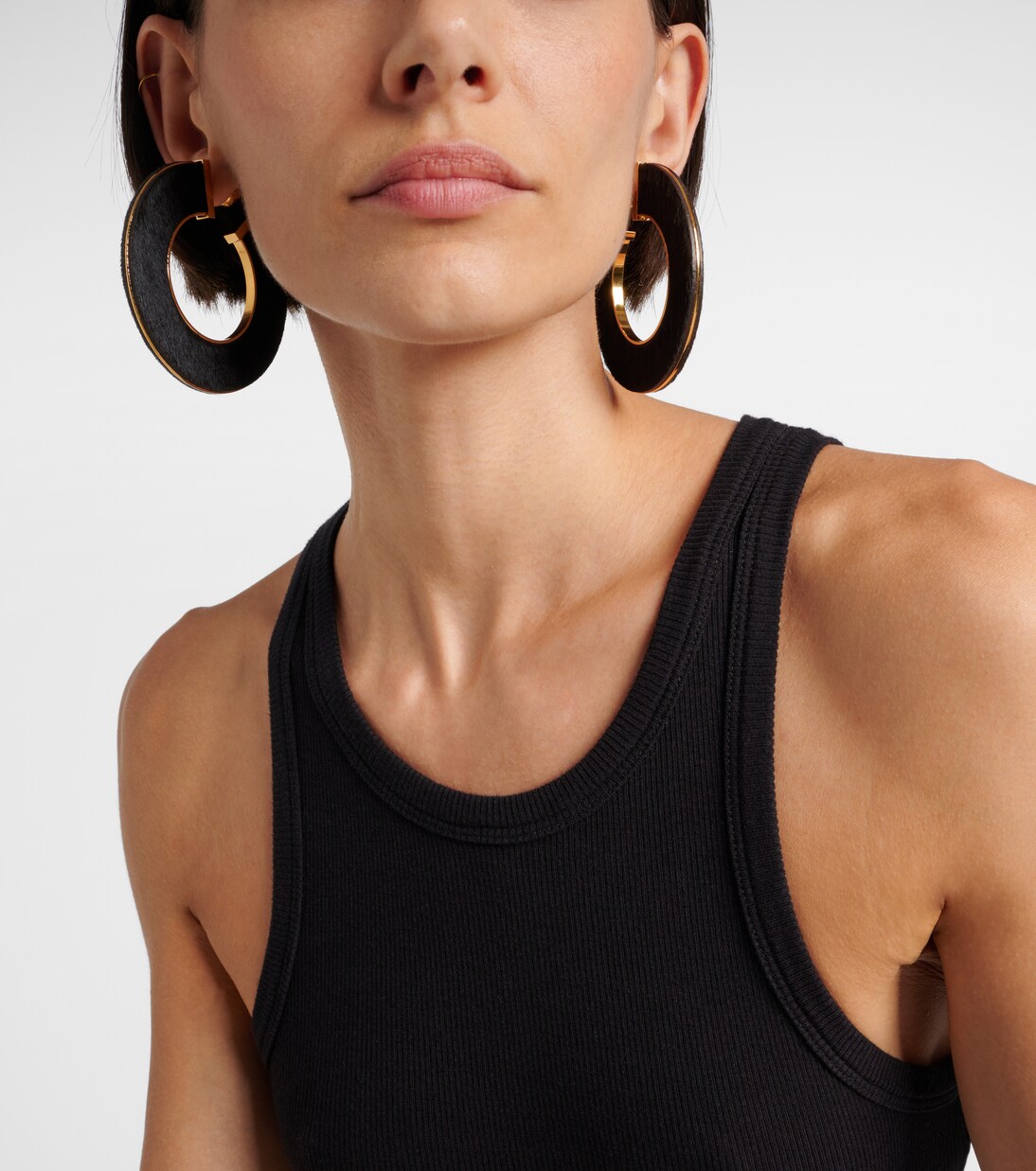 Blade Medium leather hoop earrings | Alaïa