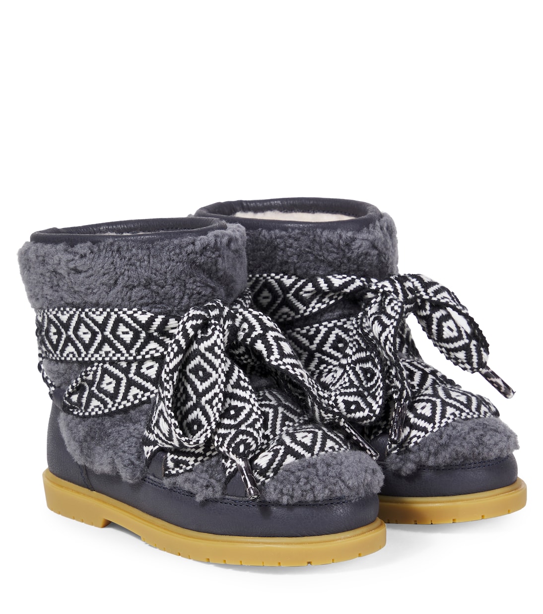 Walaya shearling-trimmed boots | Donsje
