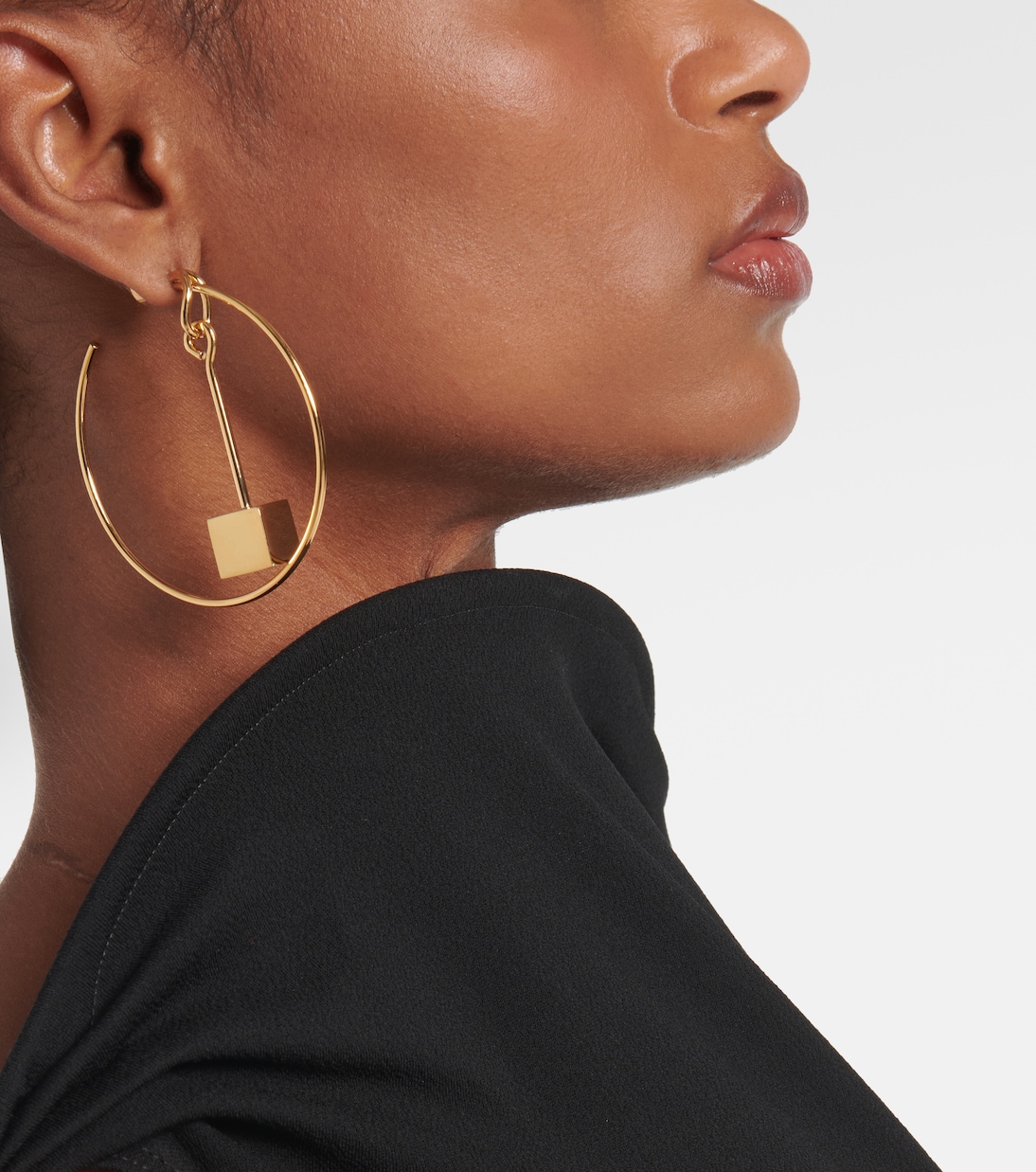 Asymmetric hoop earrings | Jacquemus