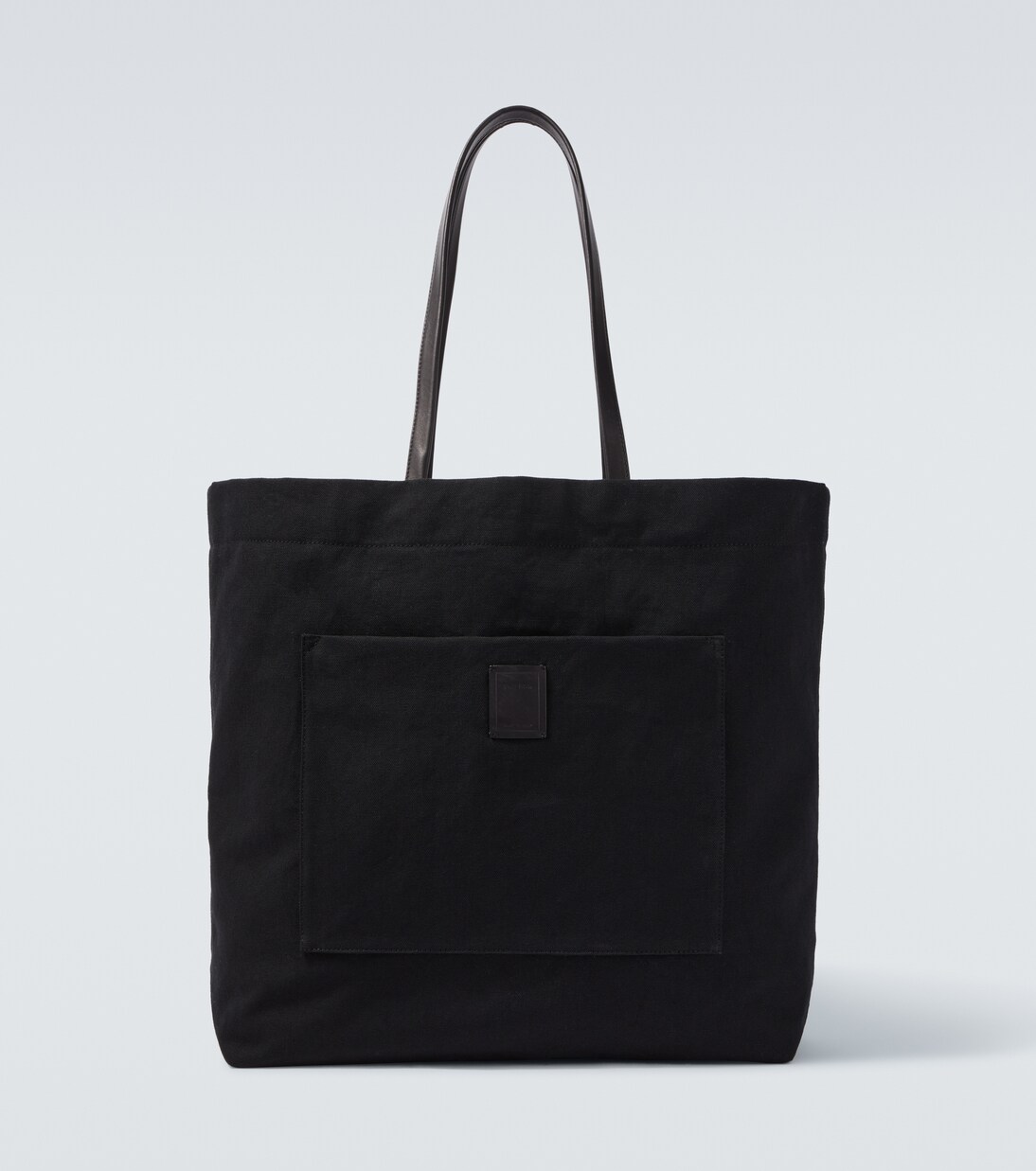 Tori leather-trimmed canvas tote bag | The Row