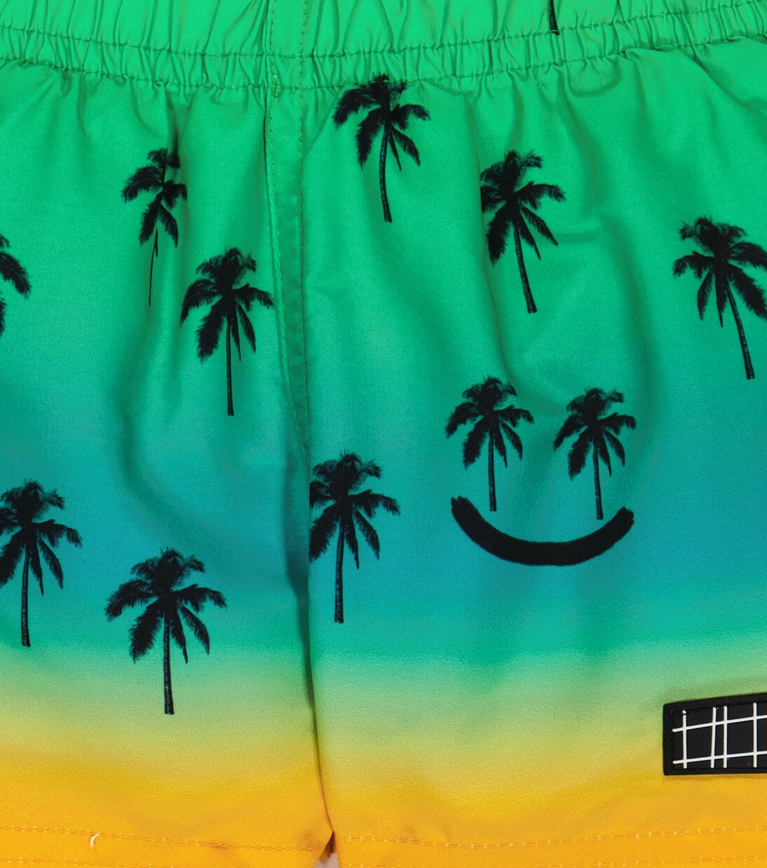 Baby Niko printed swim trunks | Molo