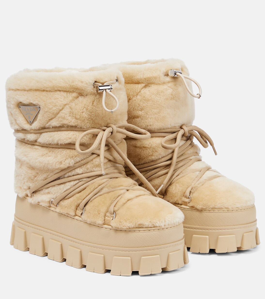 Shearling and leather snow boots | Prada
