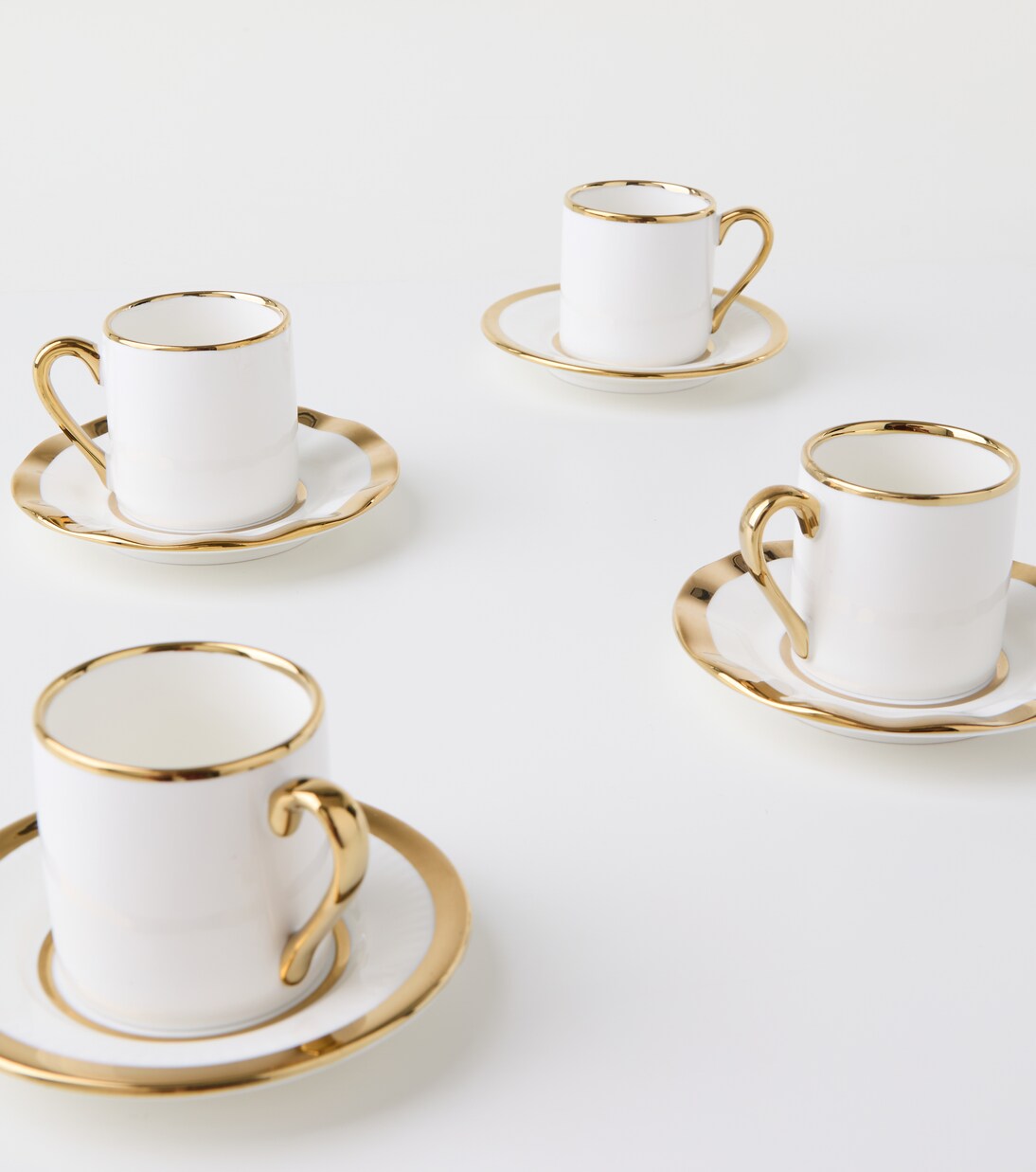 Set Golden Fins aus vier Espressotassen und Untertassen by Jan Wolleswinkel | Polspotten