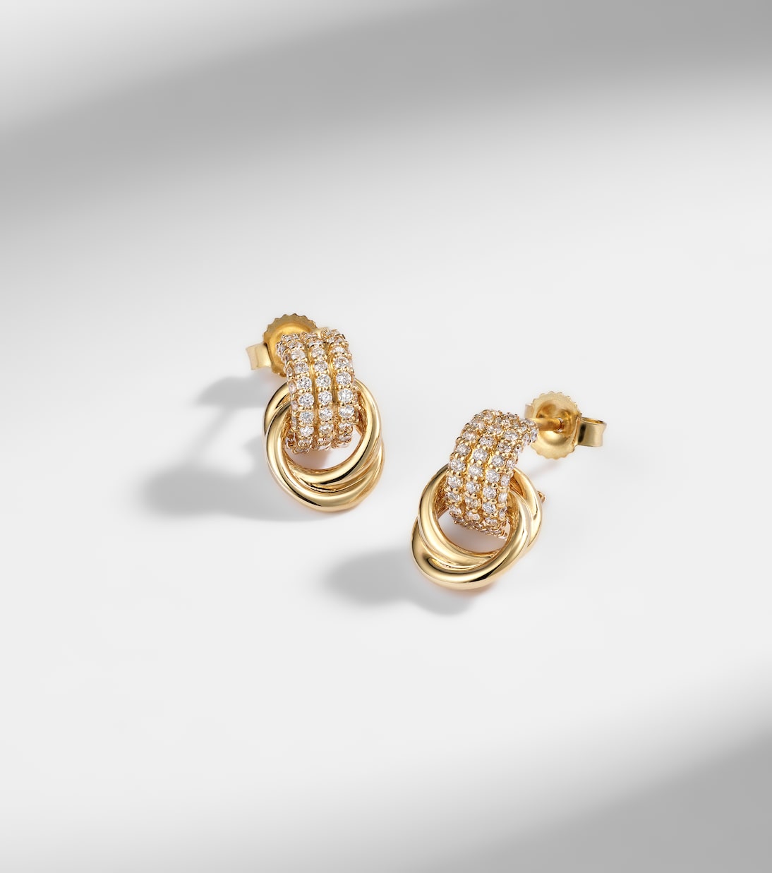 Forme Knot 14kt gold earrings with diamonds | Stone and Strand