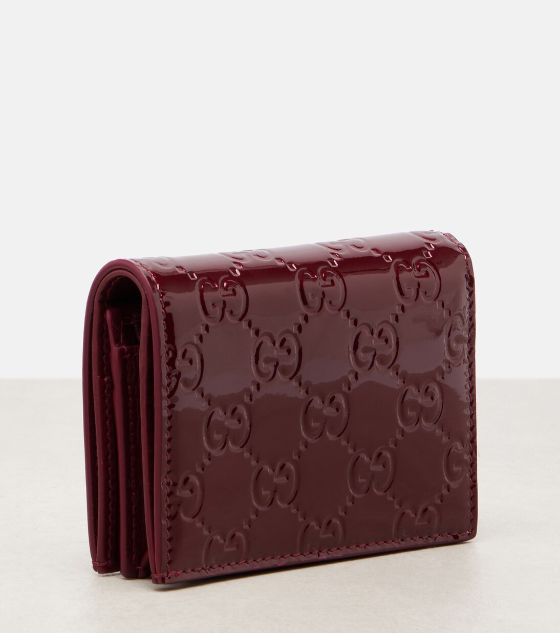 GG Emblem patent leather wallet | Gucci