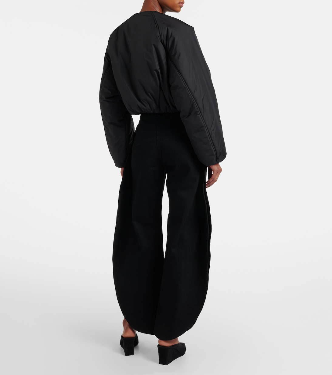 Faded barrel-leg jeans | Alaïa