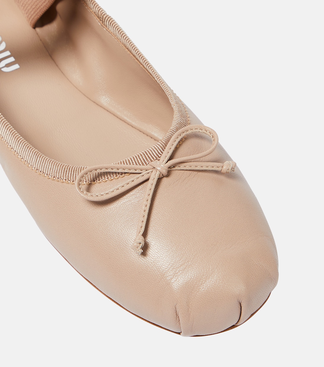 Ballerine in pelle con logo | Miu Miu