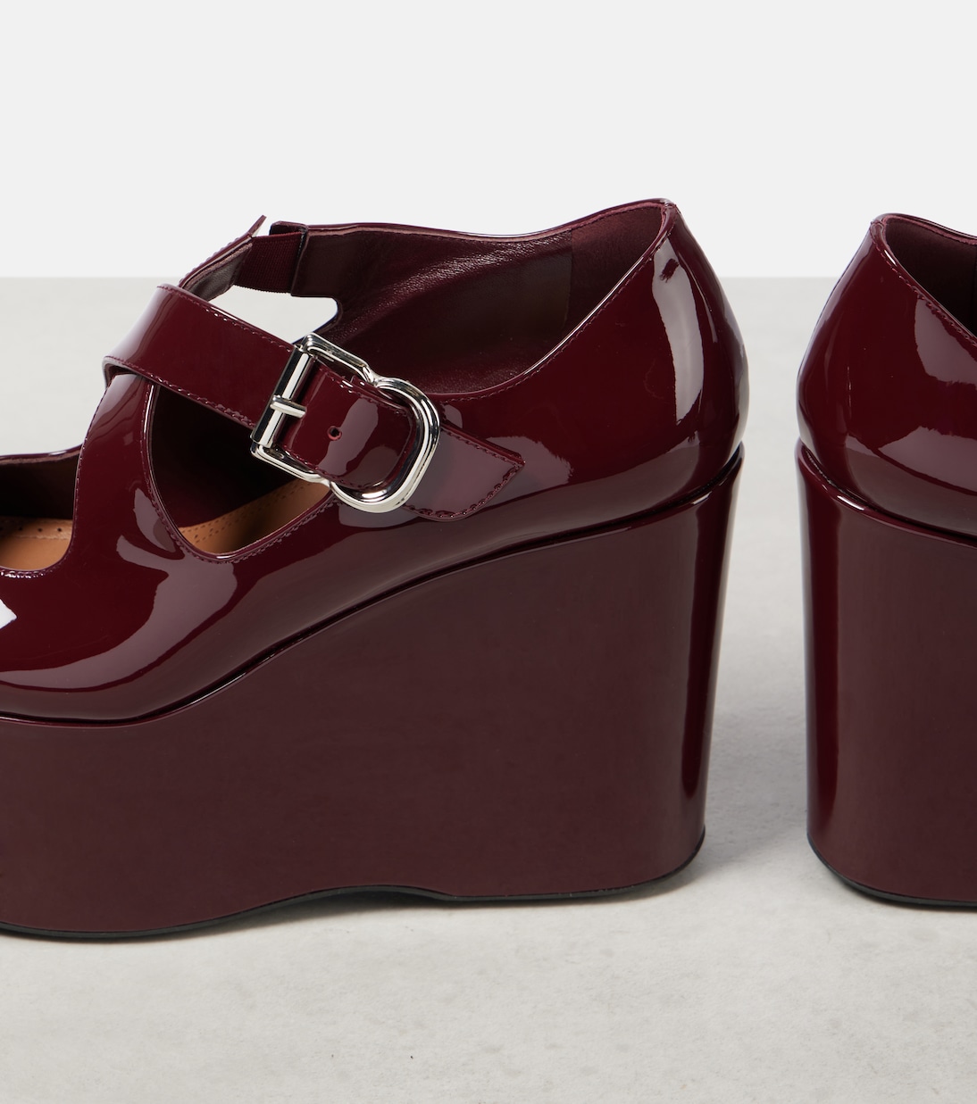 Pumps Criss Cross 110 in vernice con zeppa | Alaïa