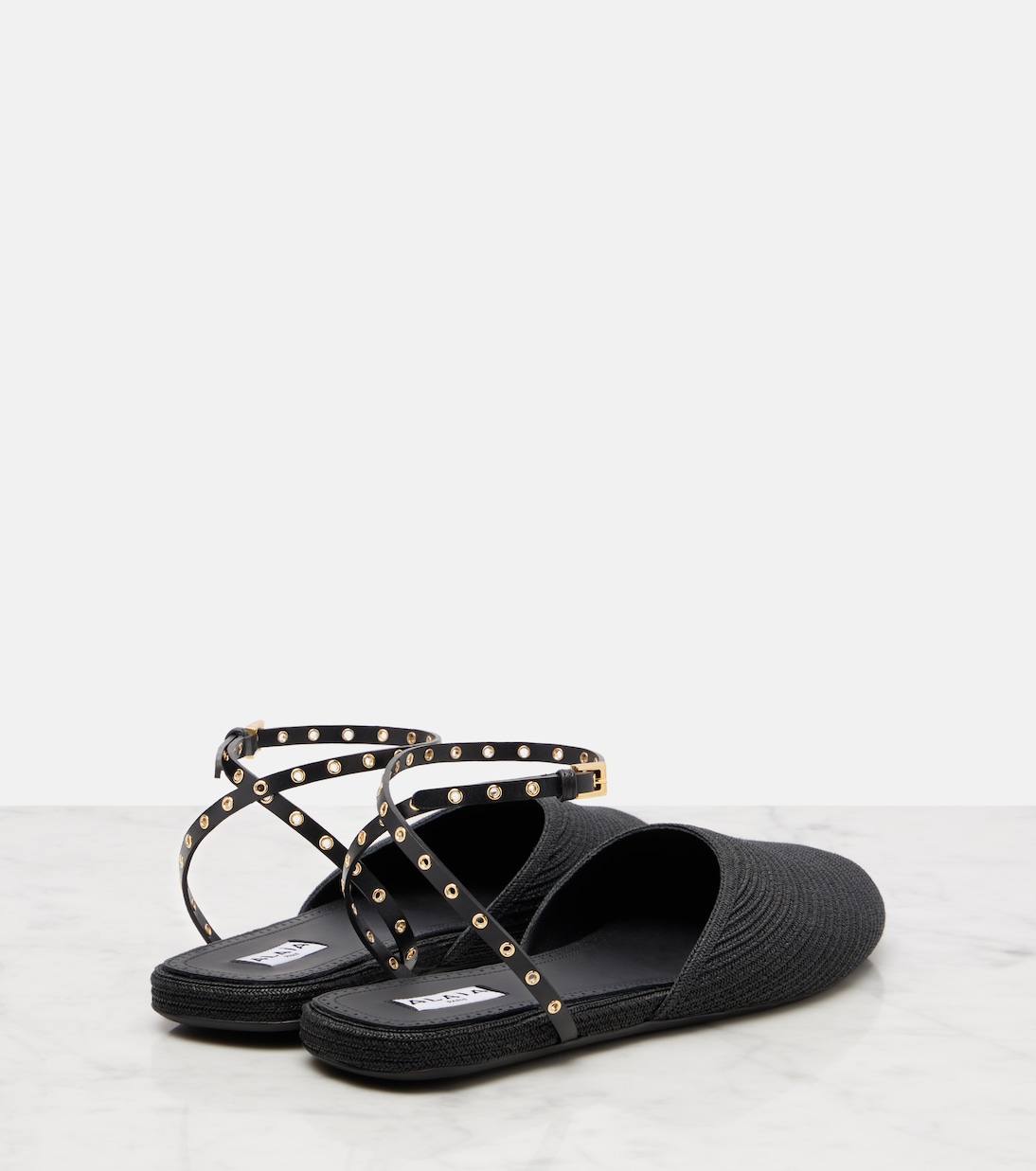 Leather-trimmed slingback flats | Alaïa