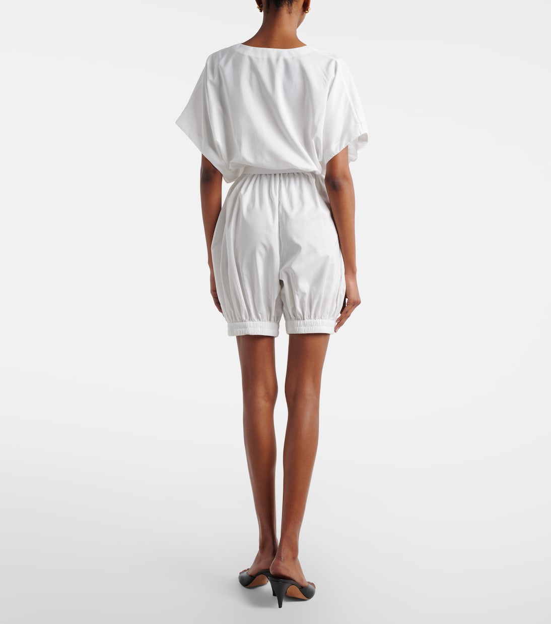 Jumpsuit corta con cintura | Norma Kamali