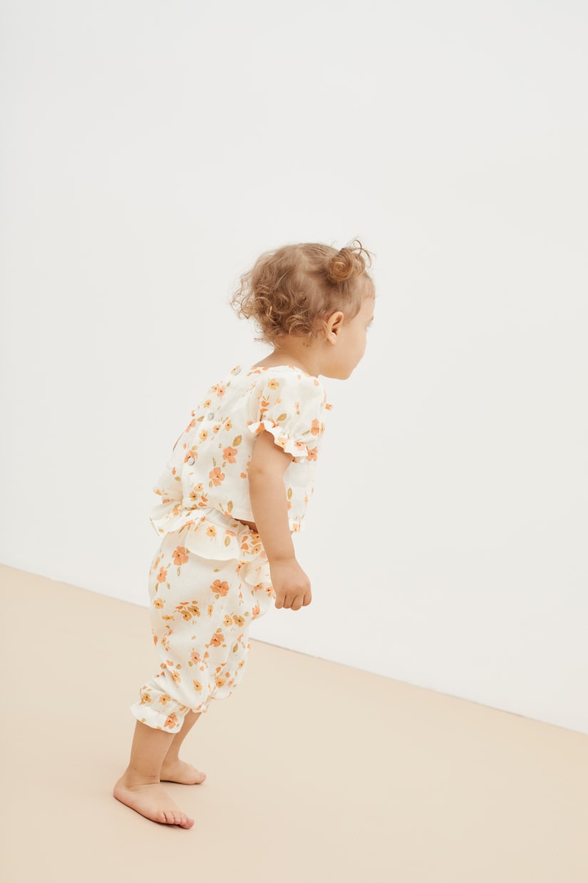 Baby Fiorella floral cotton pants | The New Society